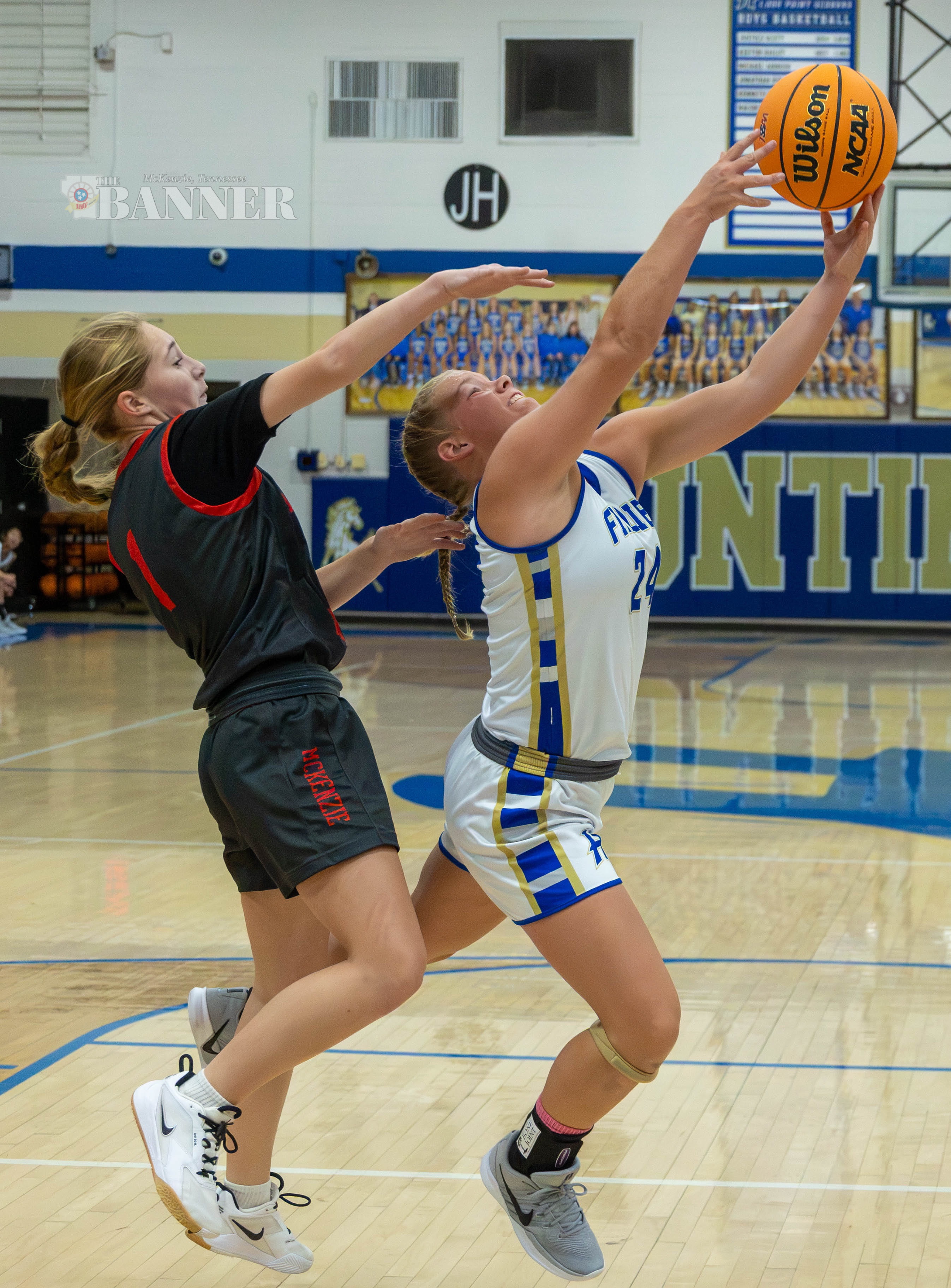 HMS Sweeps MMS in Basketball