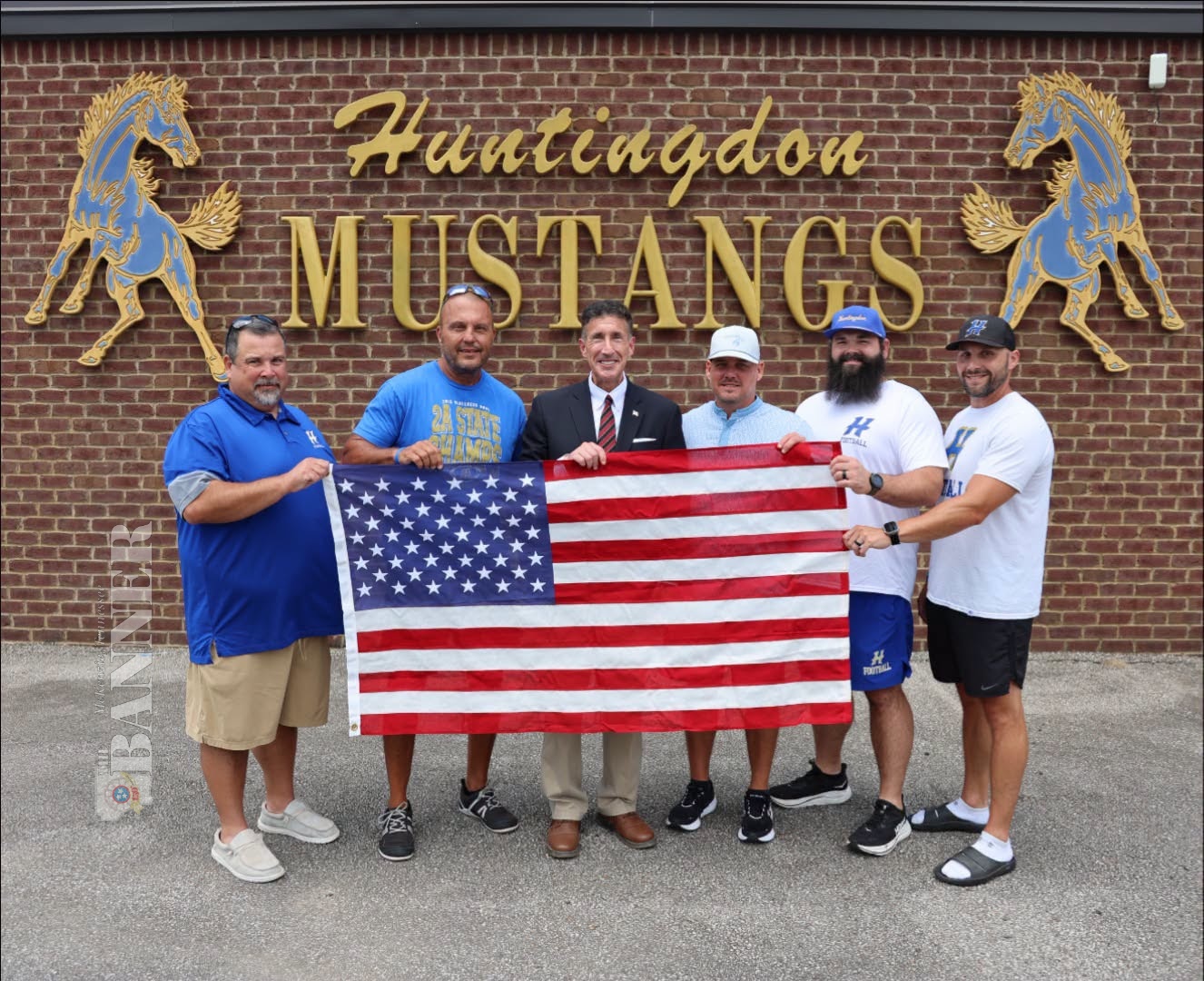Kustoff Recognizes Mustang Team with Flag Presentation