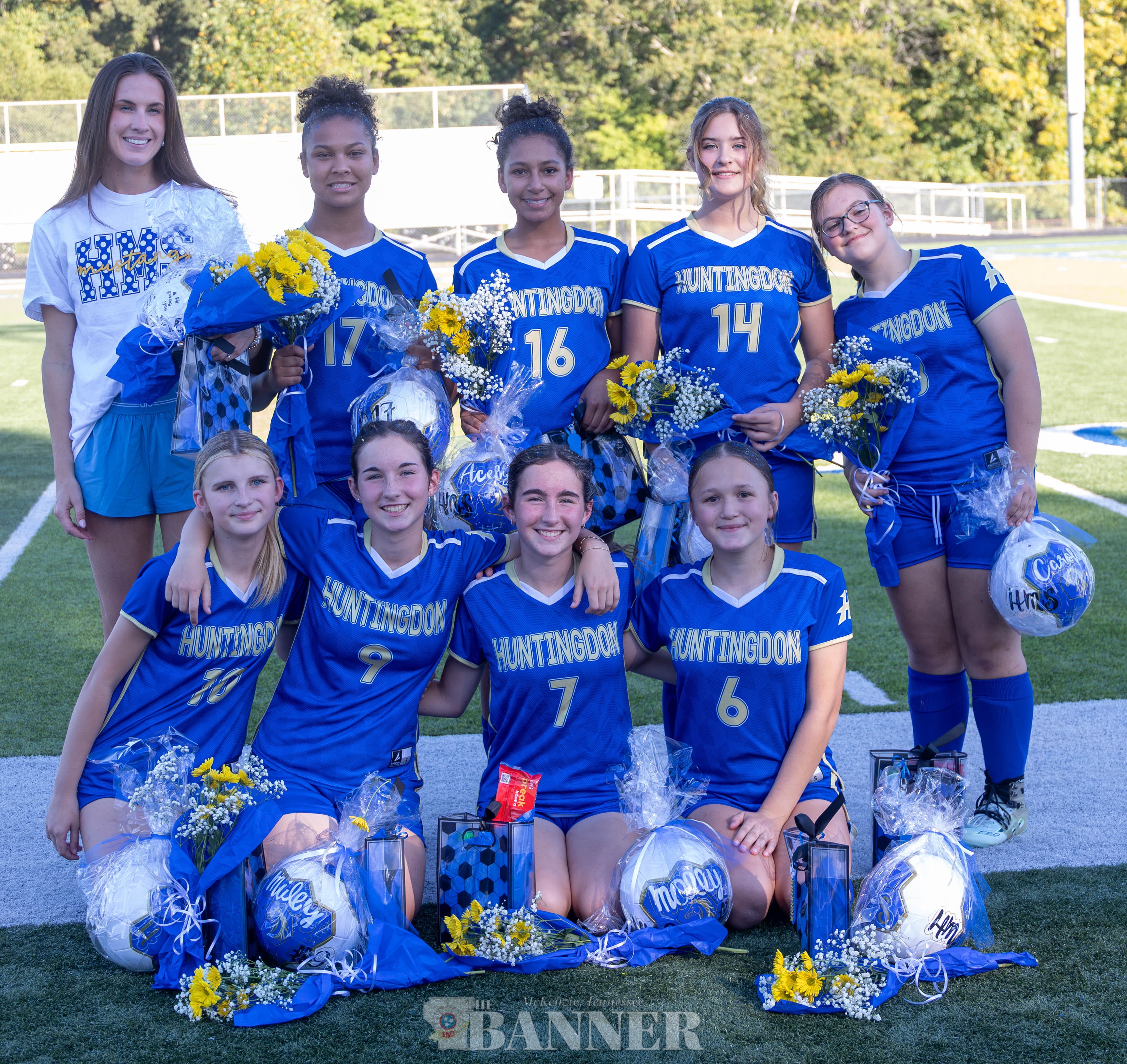 Eighth grade HMS Fillies players and coach Miller Garner