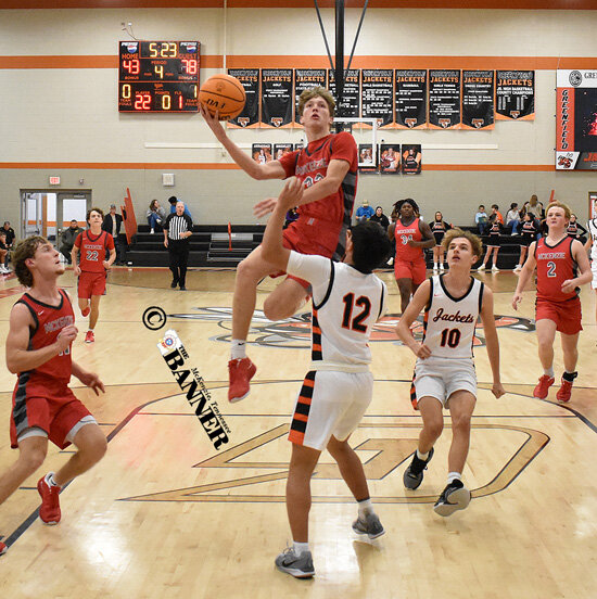Rebels Win Big at Greenfield, Lady Rebels Fall