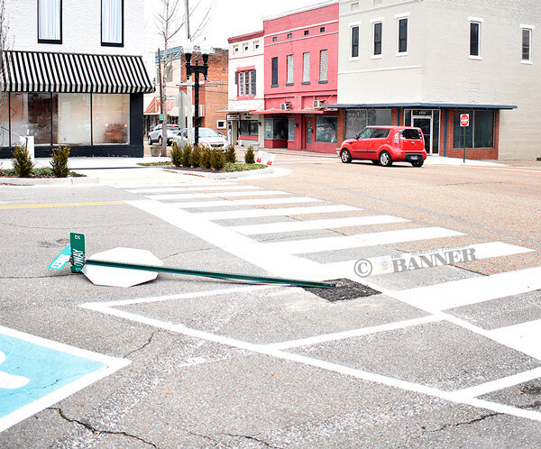 Downtown Stop Sign Struck by Driver
