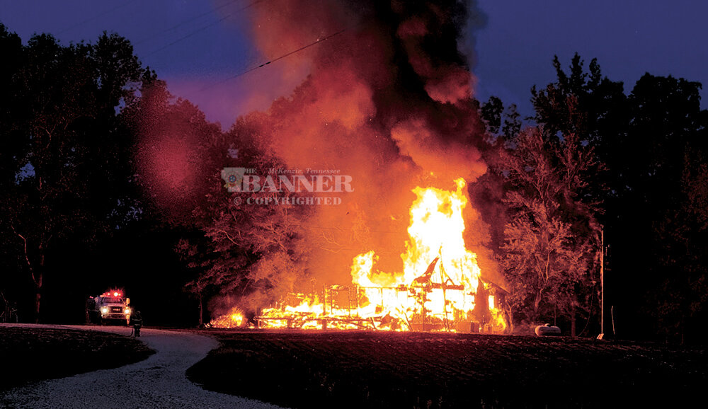 Rural Fire Destroys Log Cabin