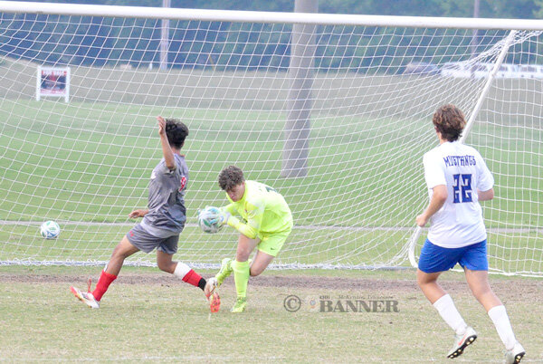 20250508-162624-4ac-web2-MHS-HHS-soccer-Foster-DSC_0114.jpg