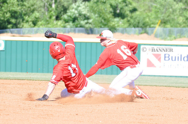Rebels Top Whitwell in Opener