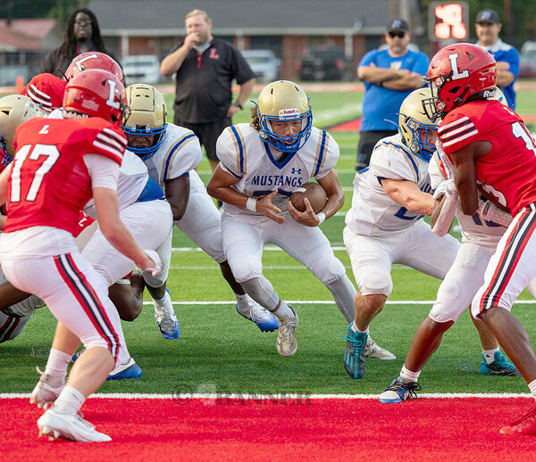 Mustangs Edge Lexington in Jamboree Action