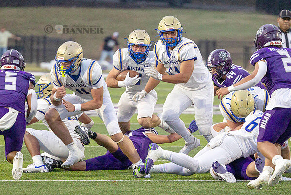 Mustangs Corralled by Bulldog Defense