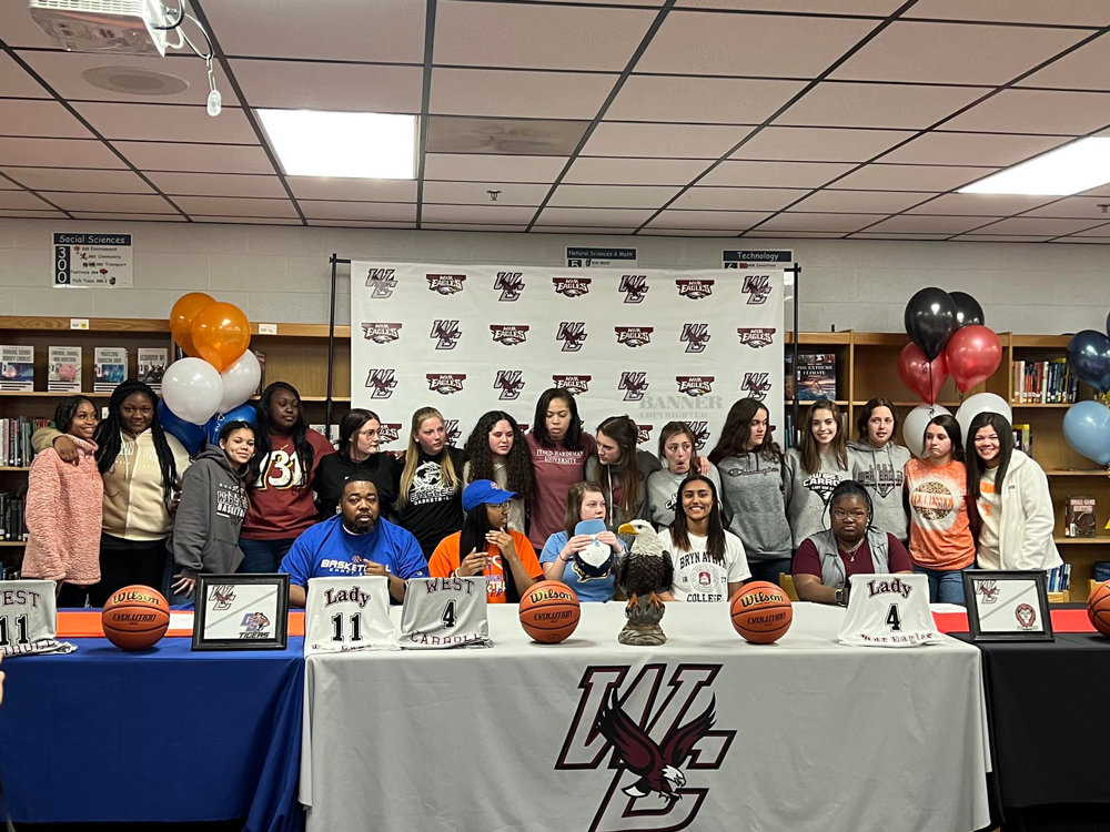 20220426-110303-web-West-Carroll-Team-With-Signees.jpg