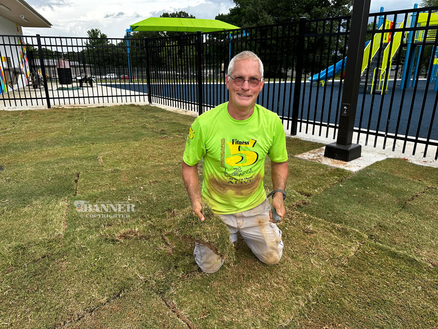 Volunteers Lay Sod at Inclusion Park on Monday