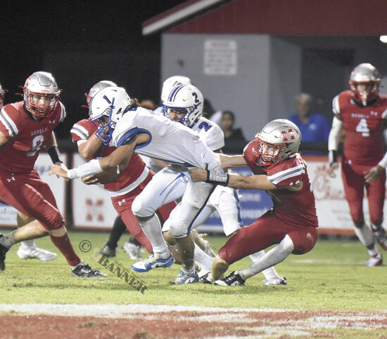 Rebels Survive Soggy First Half to Clip Eagles, 20-13