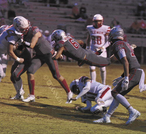 Rebels Rout Warriors, 49-7