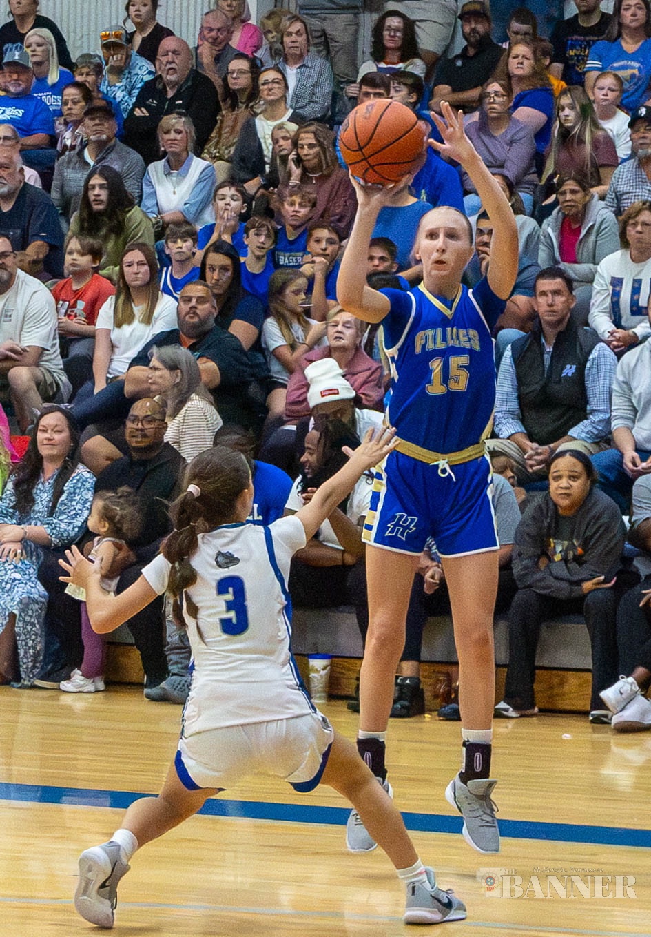 June Dillahunty gets off a jump shot in Fillies win over Inman