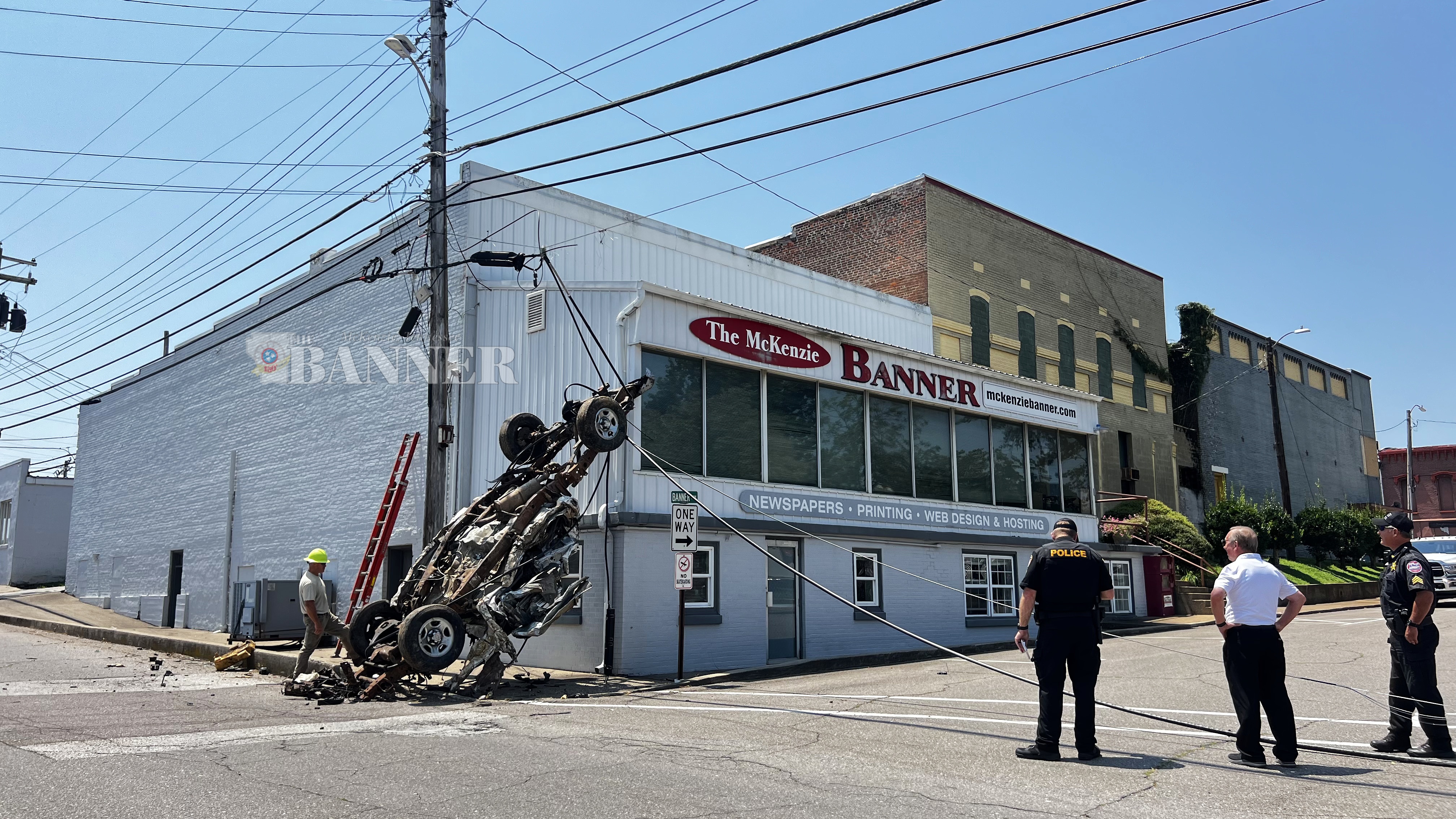 Scrap Car Snags Utility Lines