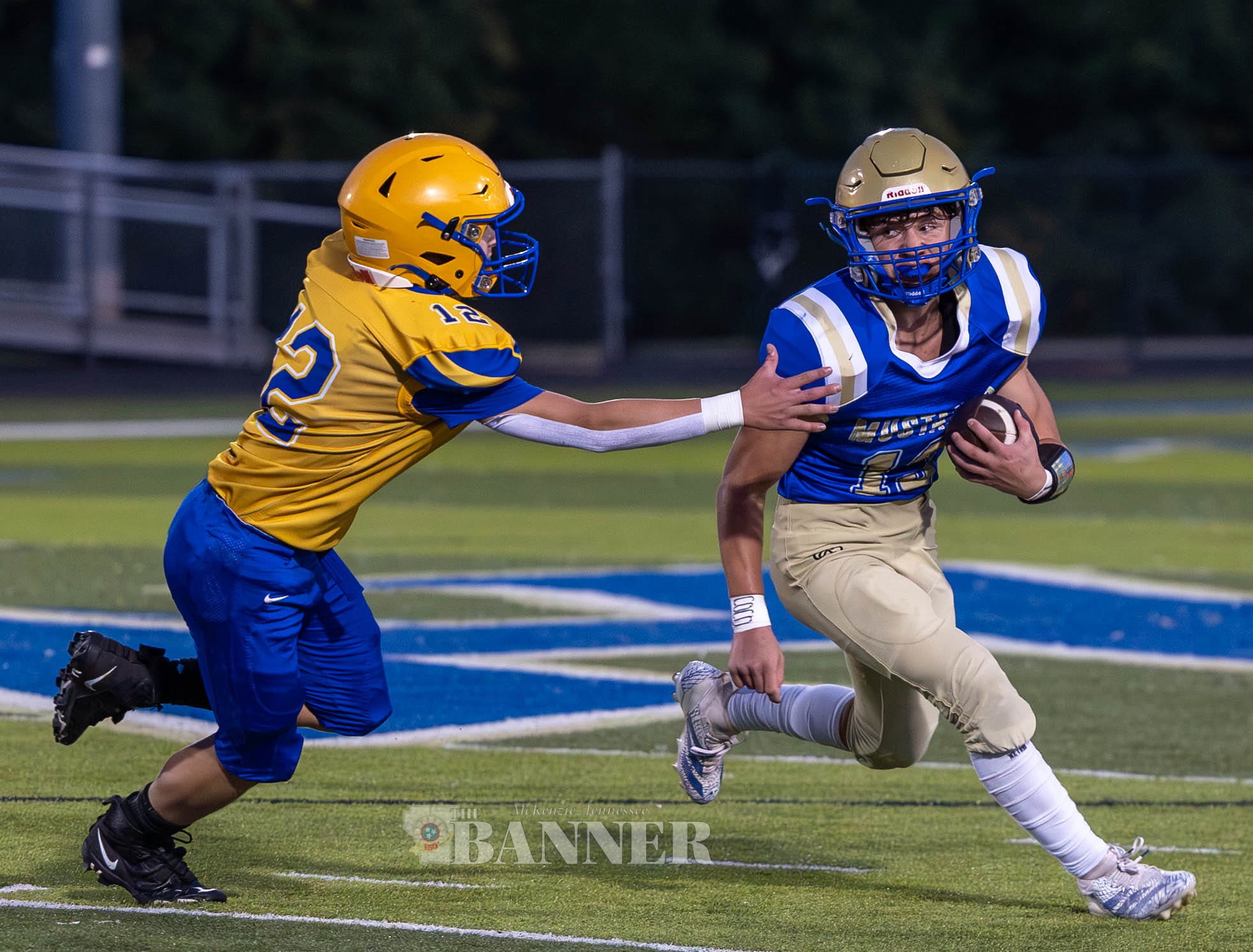 Cohen Gray attempts to break a tackle in Mustangs win over Decatur County